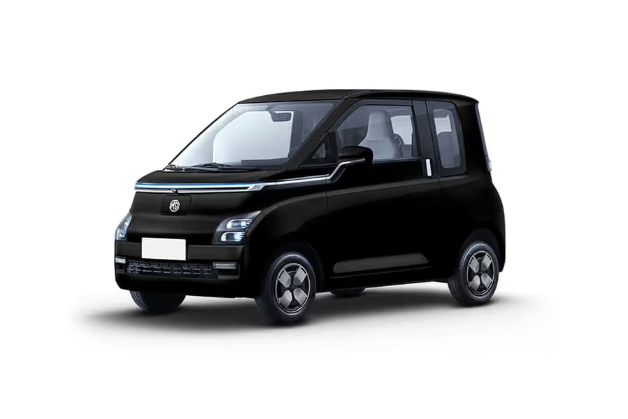 MG Comet EV Executive Hatchback Electric car front three-quarter view India 2026 price mileage safety specs side by side car comparison vs Tata Tiago EV AiCarAdvisor