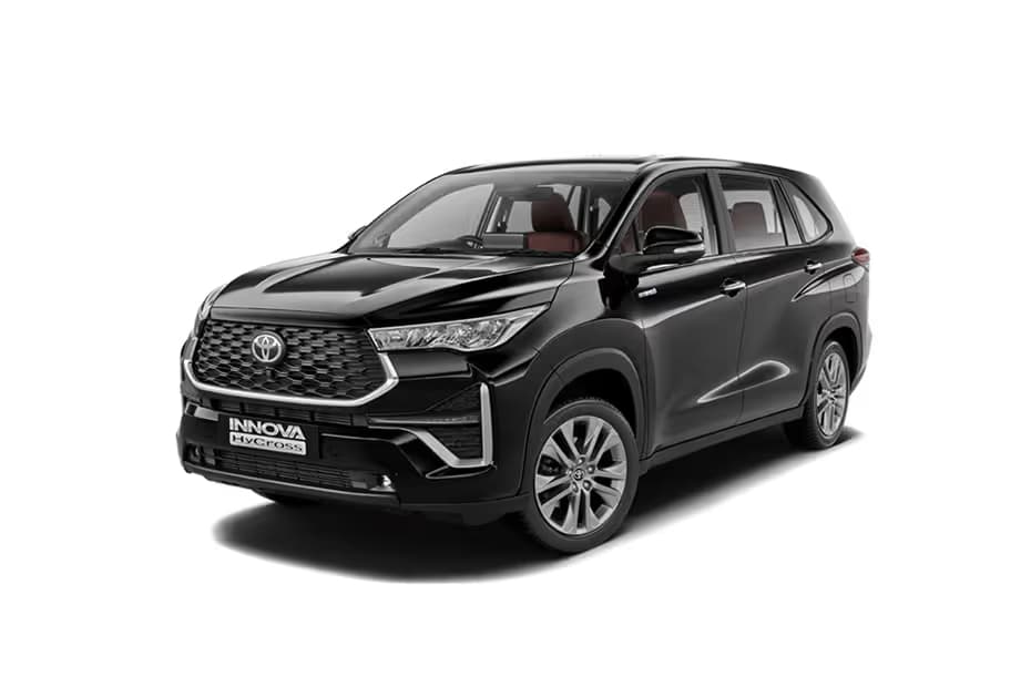 Toyota Innova Hycross G Fleet 7STR MUV Petrol car front three-quarter view India 2026 price mileage safety specs side by side car comparison vs Maruti Suzuki Invicto AiCarAdvisor