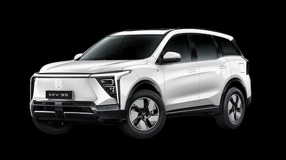 Mahindra XEV 9S Pack One Above 59kWh SUV Electric car front three-quarter view India 2026 price mileage safety specs side by side car comparison vs Mahindra BE 6 AiCarAdvisor