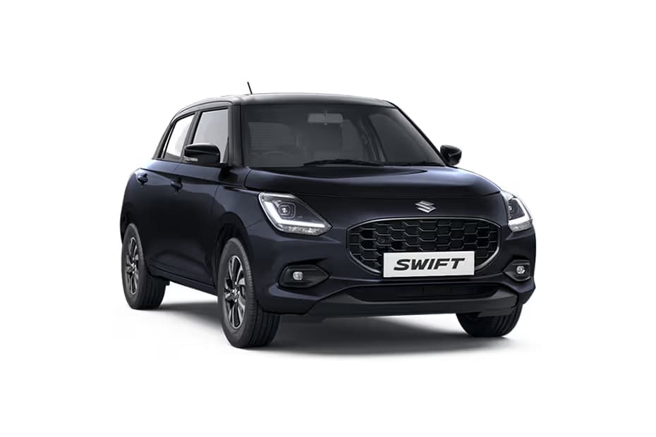 Maruti Suzuki Swift LXi Hatchback Petrol car front three-quarter view India 2026 price mileage safety specs side by side car comparison vs Hyundai Grand i10 Nios AiCarAdvisor