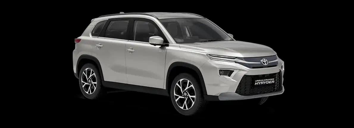 Toyota Hyryder E Hatchback Petrol car front three-quarter view India 2026 price mileage safety specs side by side car comparison vs Maruti Suzuki Grand Vitara AiCarAdvisor
